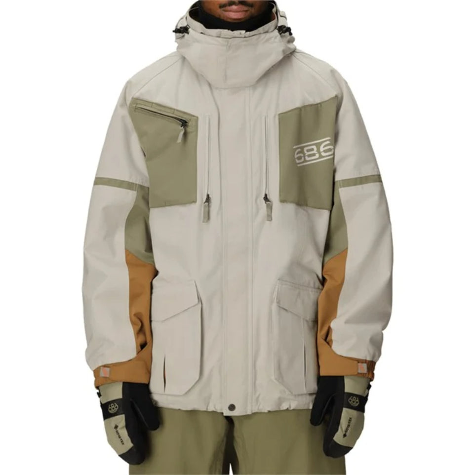 The 686 2001 Transfer Men's Jacket in limestone Colorblock