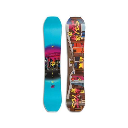 The Yes Jackpot Snowboard 2025 in blue with a streetscape on the base.