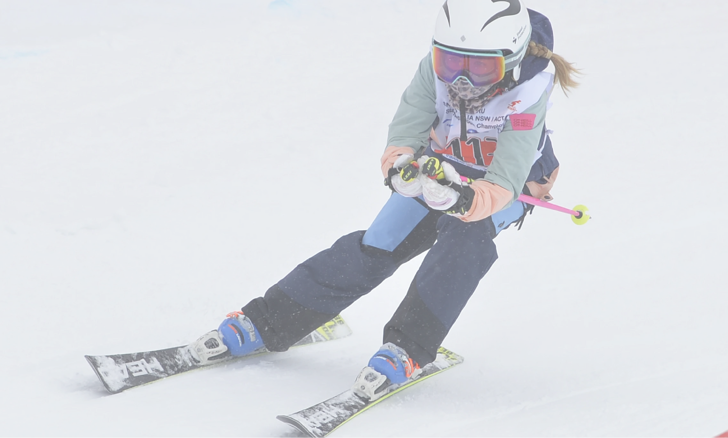 Skier in action on a snowy slope