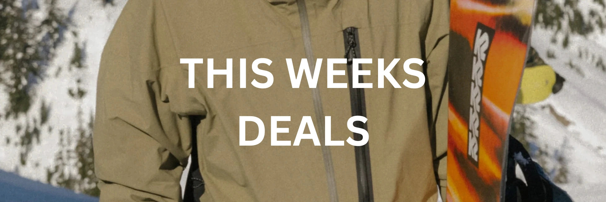 Person holding a snowboard with 'This Week's Deals' text overlay